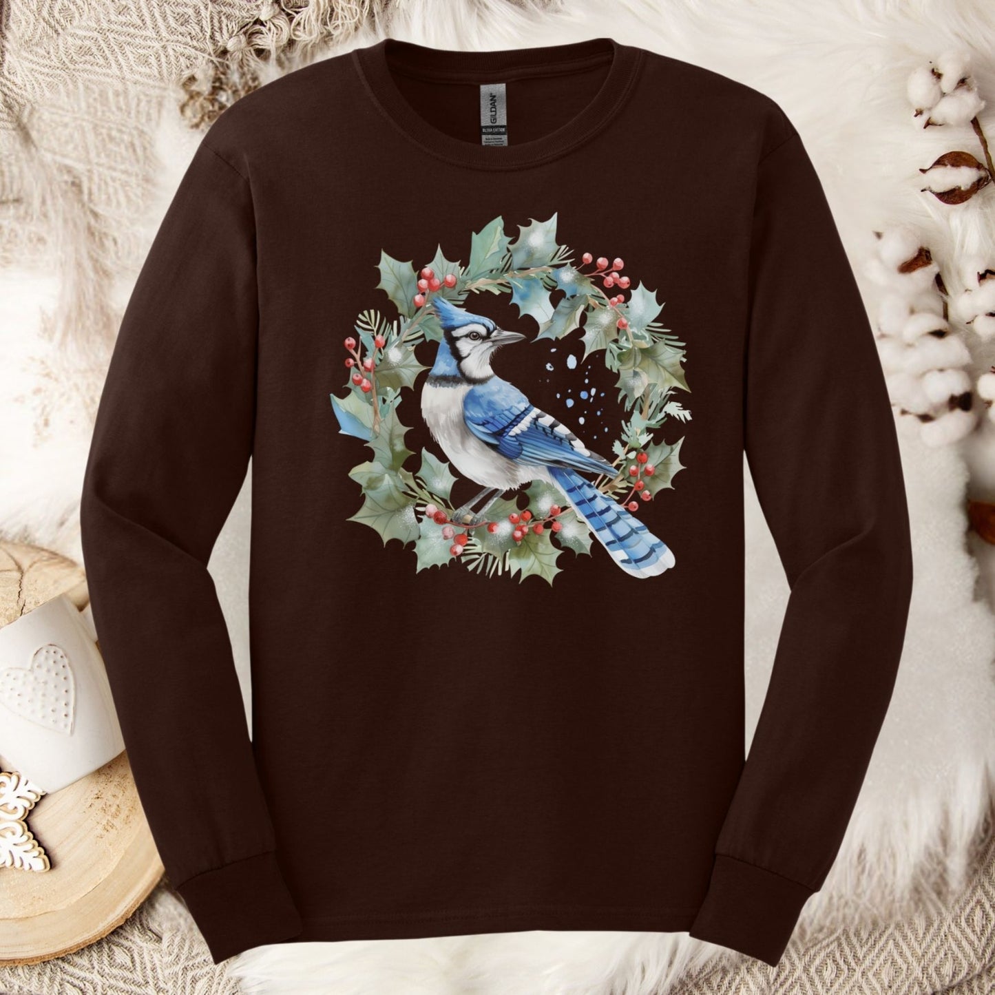 Dark Chocolate long sleeve tee with a watercolor blue jay in a holly wreath design.