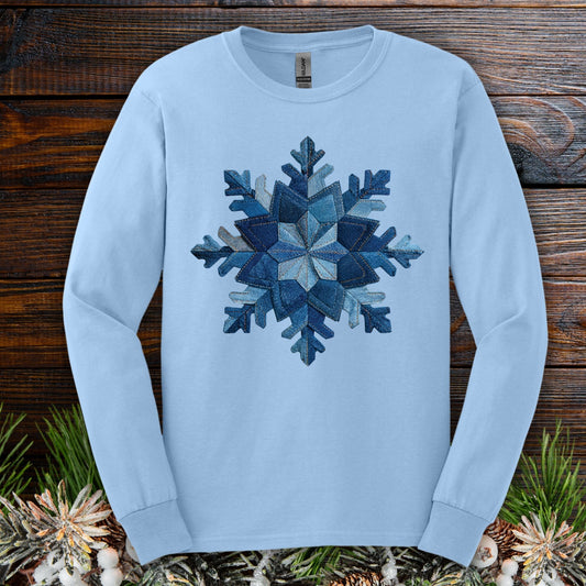 Light blue long sleeve tee with a faux patchwork denim snowflake design.