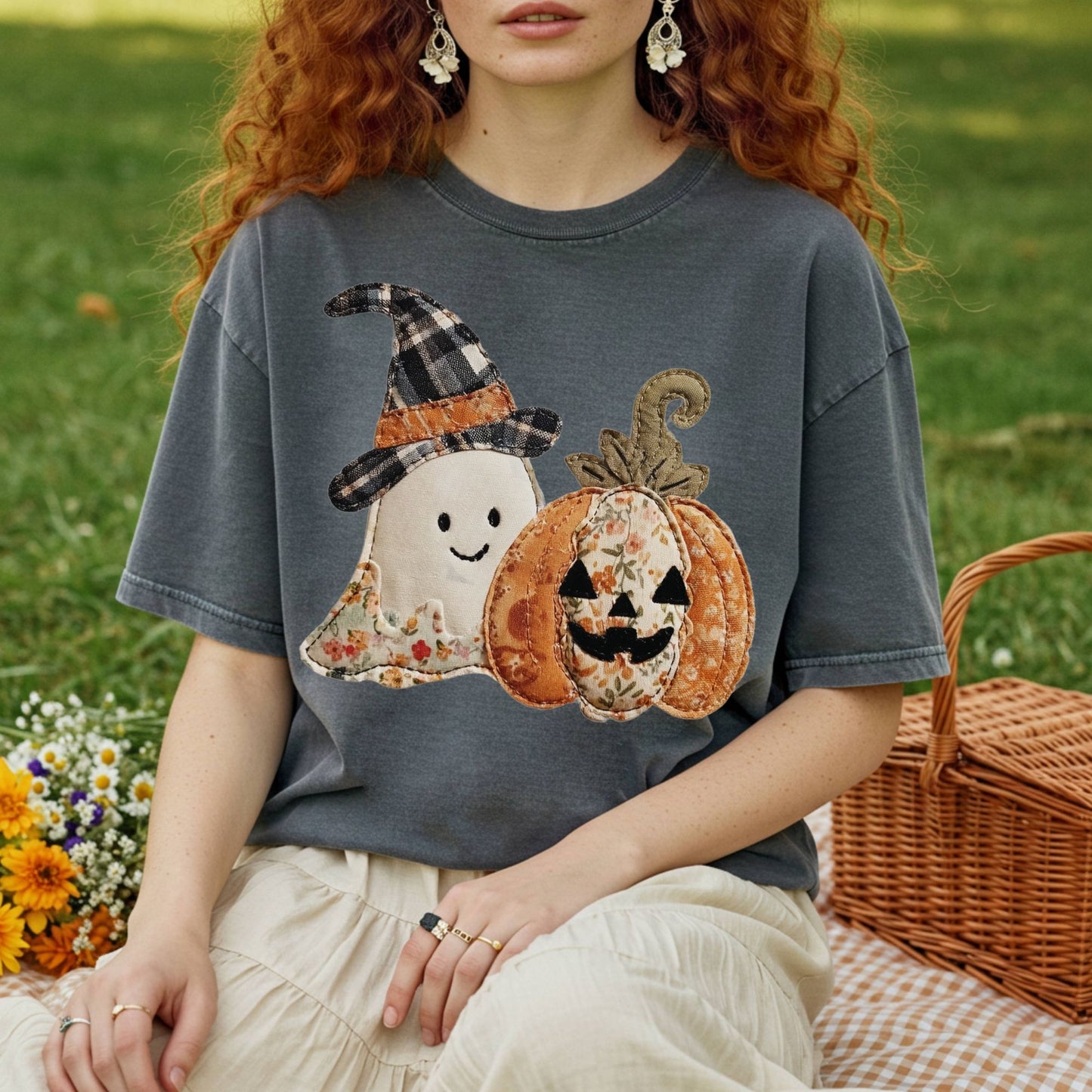Charcoal Comfort Colors t-shirt with a faux patchwork ghost and jack o'lantern design.