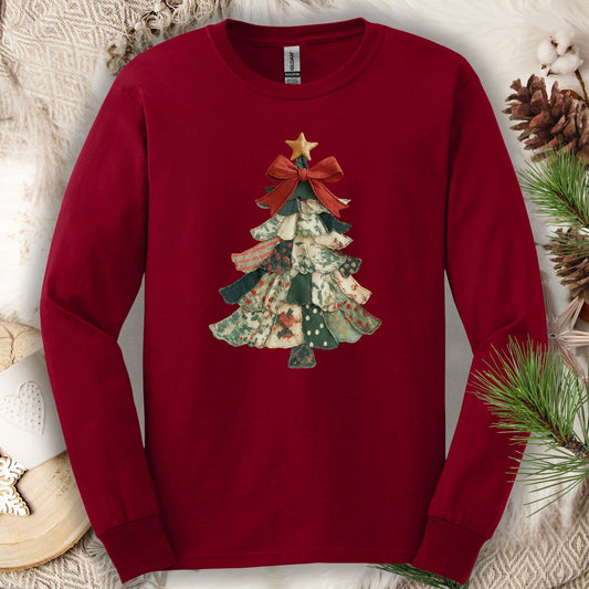 Cardinal red long sleeve tee with a cottagecore patchwork Christmas tree design and a gold star.