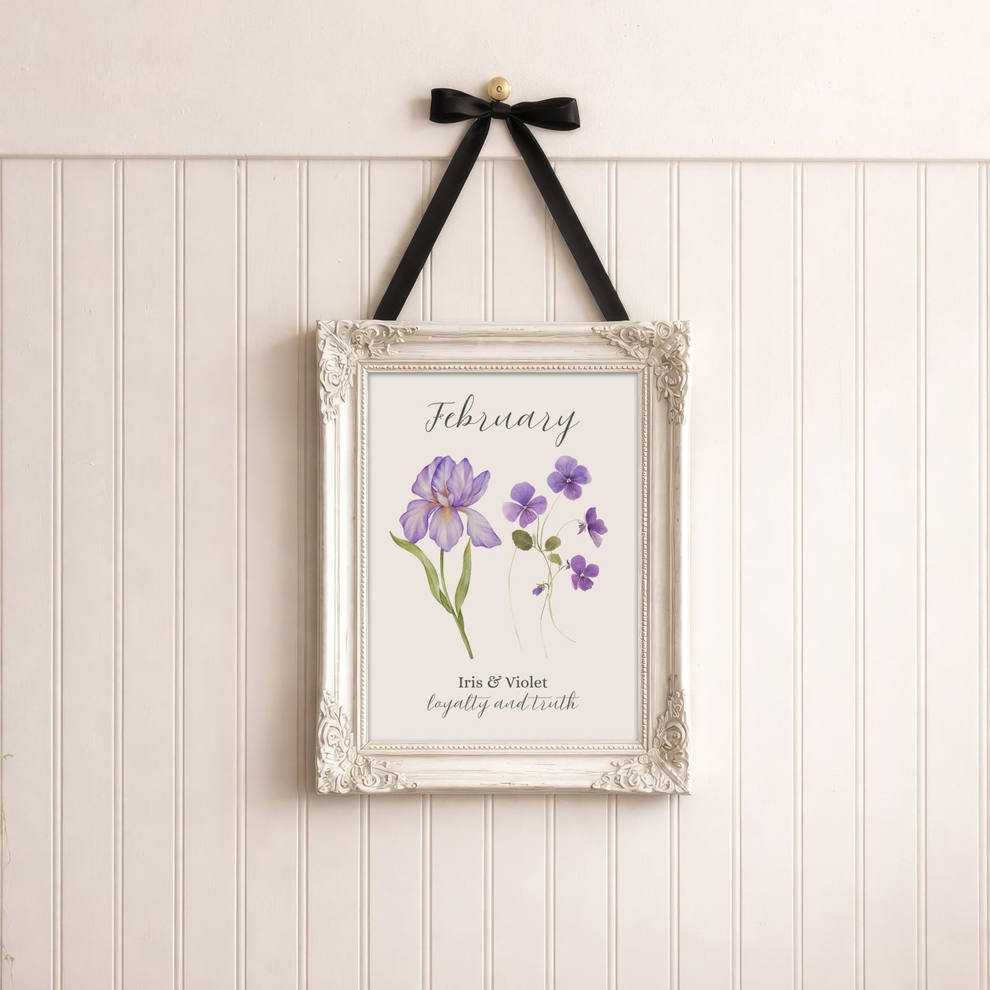 February birth flower art print in an ornate white frame with purple iris and violet flowers.