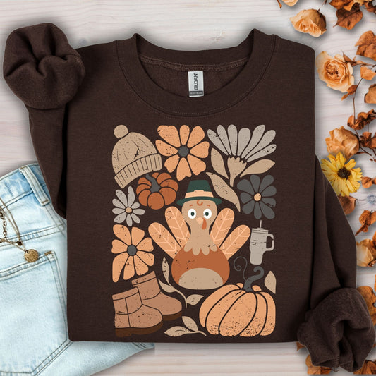 Dark Chocolate Gildan 18000 sweatshirt with a groovy turkey, fall leaves, boots, and florals.