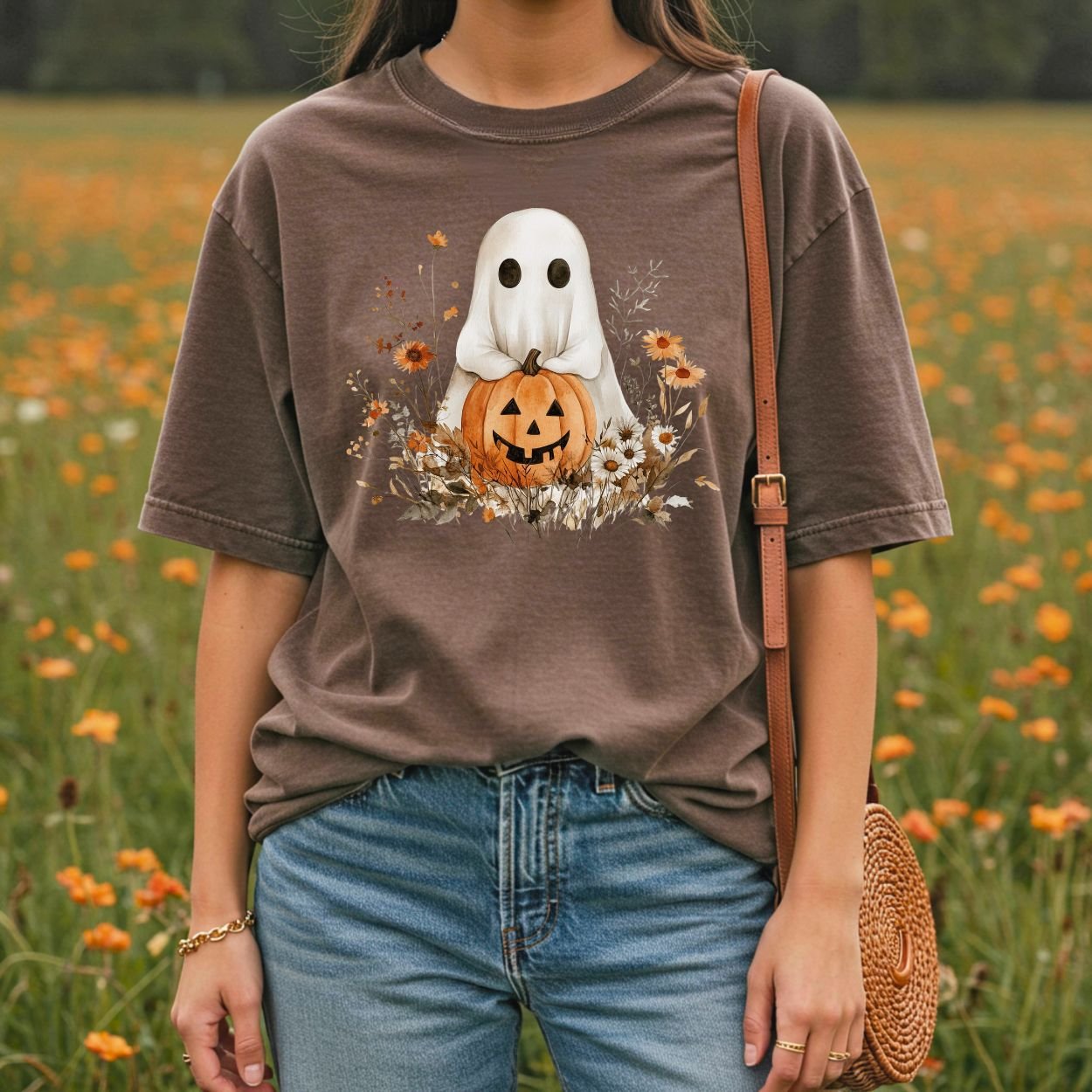 Boho ghost with jack o'lantern, pumpkins, and autumn florals on a relaxed-fit, garment-dyed brown cotton t-shirt.