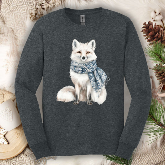 Dark Heather long-sleeve tee with a white fox wearing a blue patterned scarf, surrounded by winter decor.