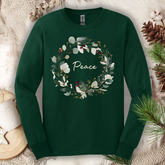 Forest Green long sleeve tee with a watercolor "Peace" Christmas wreath design.