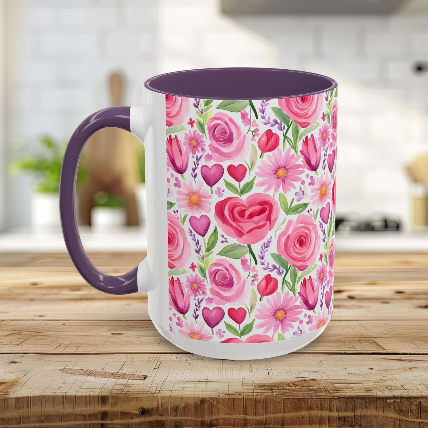 White ceramic mug with a vibrant pink rose, tulip, and heart floral pattern, purple interior, and C-shaped handle.