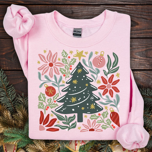 Light pink Gildan fleece sweatshirt with a colorful retro Christmas tree and floral design.
