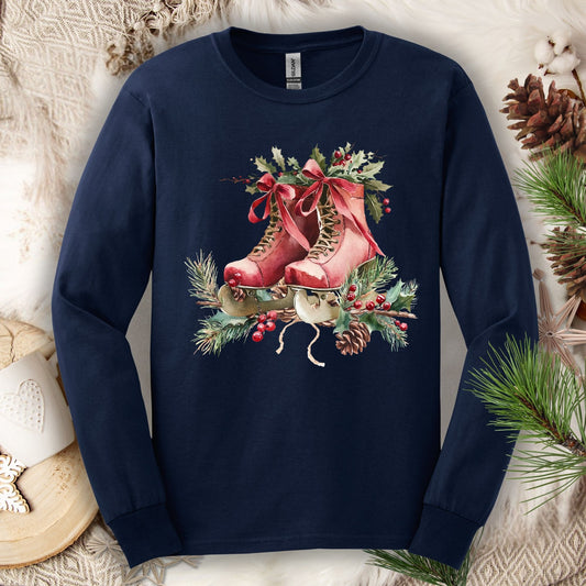 Navy long sleeve tee with watercolor red ice skates, holly, and evergreens.