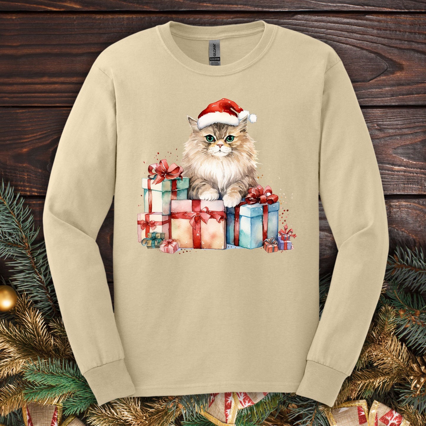 Sand long sleeve tee with a watercolor fluffy Santa cat on Christmas gifts.