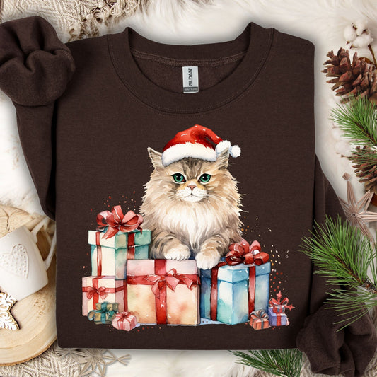 Dark Chocolate Gildan sweatshirt with a watercolor cat in a Santa hat on colorful Christmas presents.