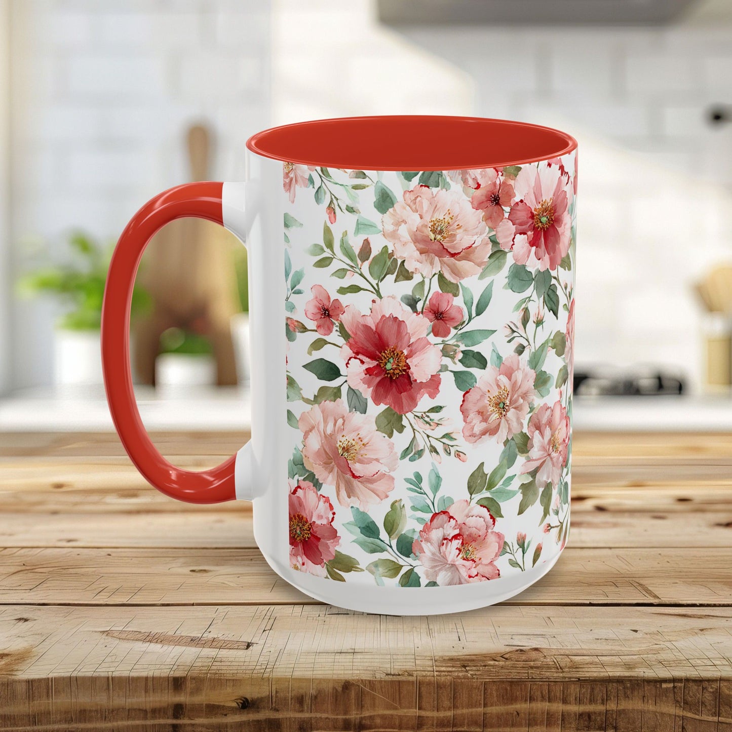 White ceramic mug with a red interior and handle, featuring a vibrant pink and red peony watercolor print.