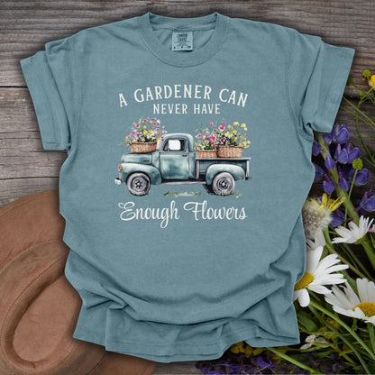 Ice Blue cotton t-shirt with a vintage pickup truck spilling watercolor flowers and "A gardener can never have enough flowers.