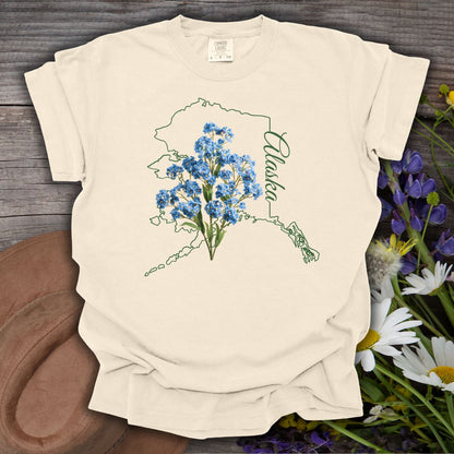 Ivory Alaska State Flower T-Shirt with blue forget-me-nots and green outline, size S.