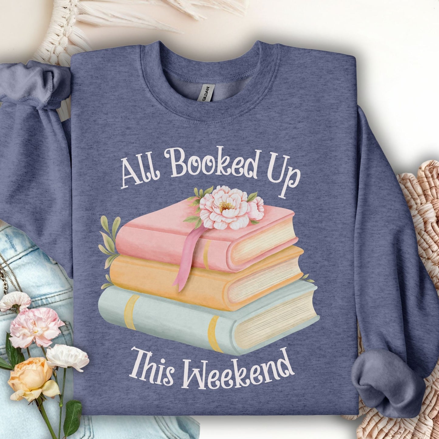 Heather Sport Dark Navy crewneck sweatshirt with "All Booked Up This Weekend" and watercolor book stack design.