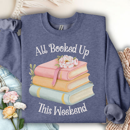 Heather Sport Dark Navy crewneck sweatshirt with "All Booked Up This Weekend" and watercolor book stack design.