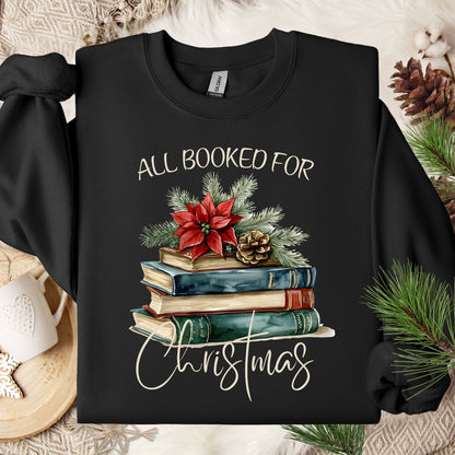 Dark Chocolate "All Booked for Christmas" sweatshirt with vintage watercolor books, poinsettia, and pine.