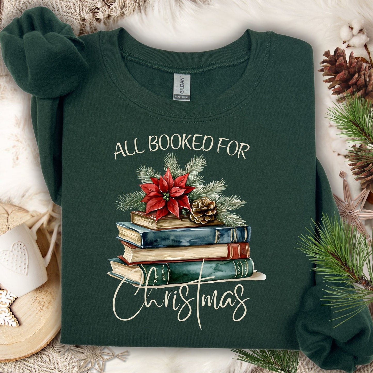 Forest Green "All Booked for Christmas" sweatshirt with vintage watercolor books, poinsettia, and evergreen design.