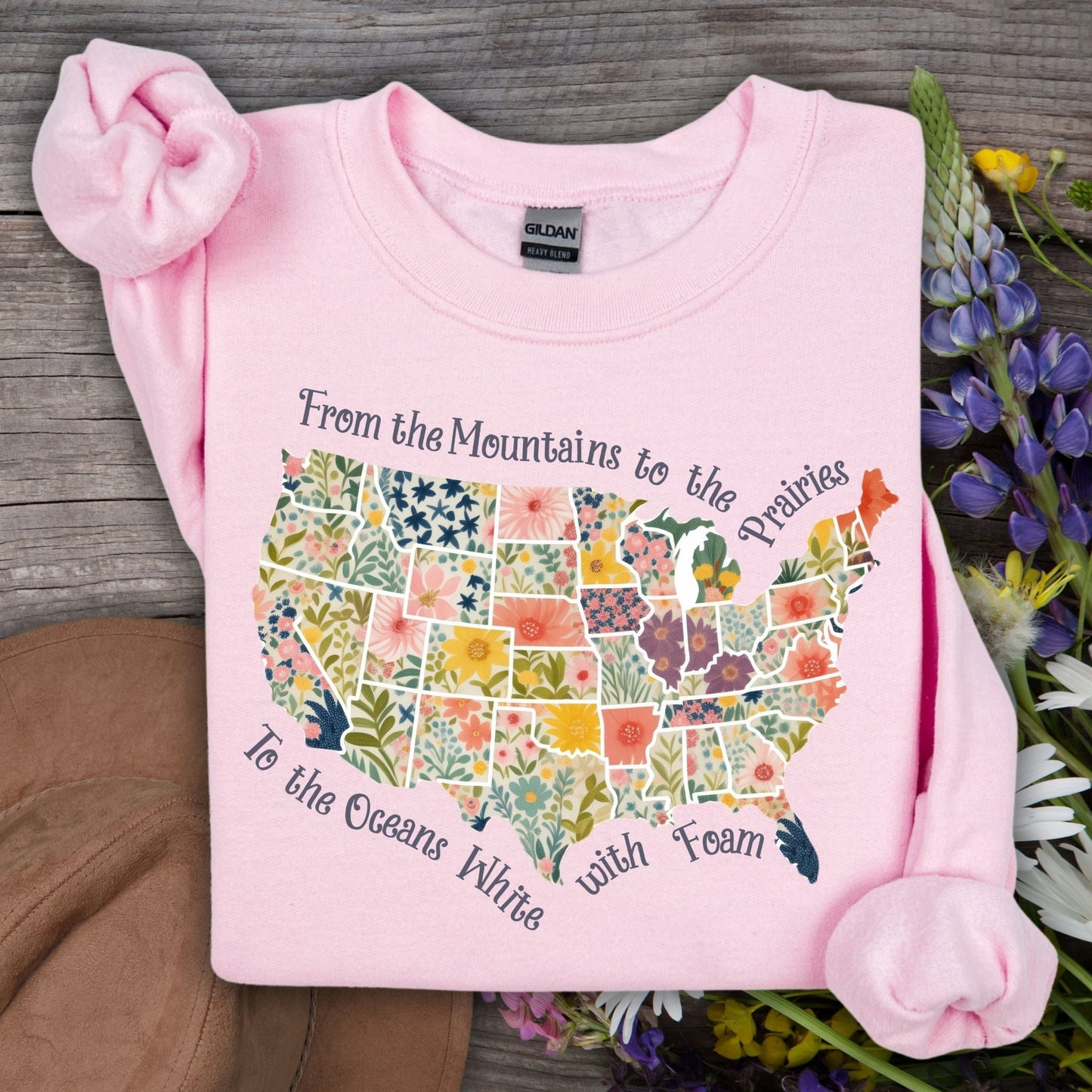 Light pink 2XL crewneck sweatshirt with a watercolor floral US map and "America the Beautiful" script.