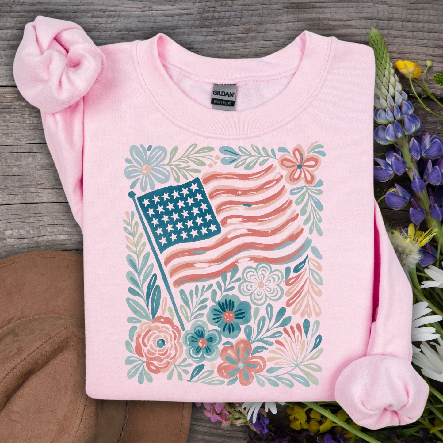 Light pink Gildan sweatshirt with a watercolor American flag and floral design.