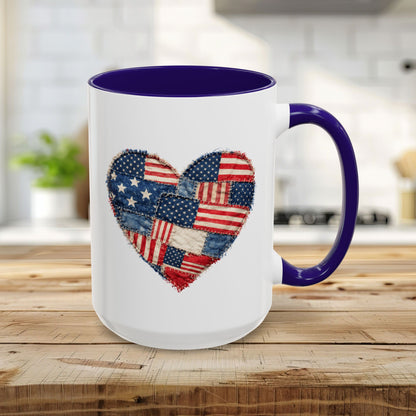 15oz white ceramic mug with a blue handle and interior, featuring a stitched American flag patchwork heart.