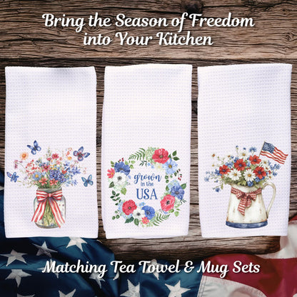 Three white microfiber tea towels with patriotic floral designs: a jar, a wreath with "grown in the USA", and a pitcher.