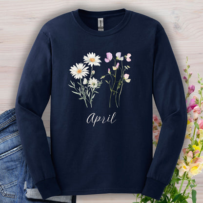Navy long sleeve tee with white daisies, pink sweet peas, and "April" script.