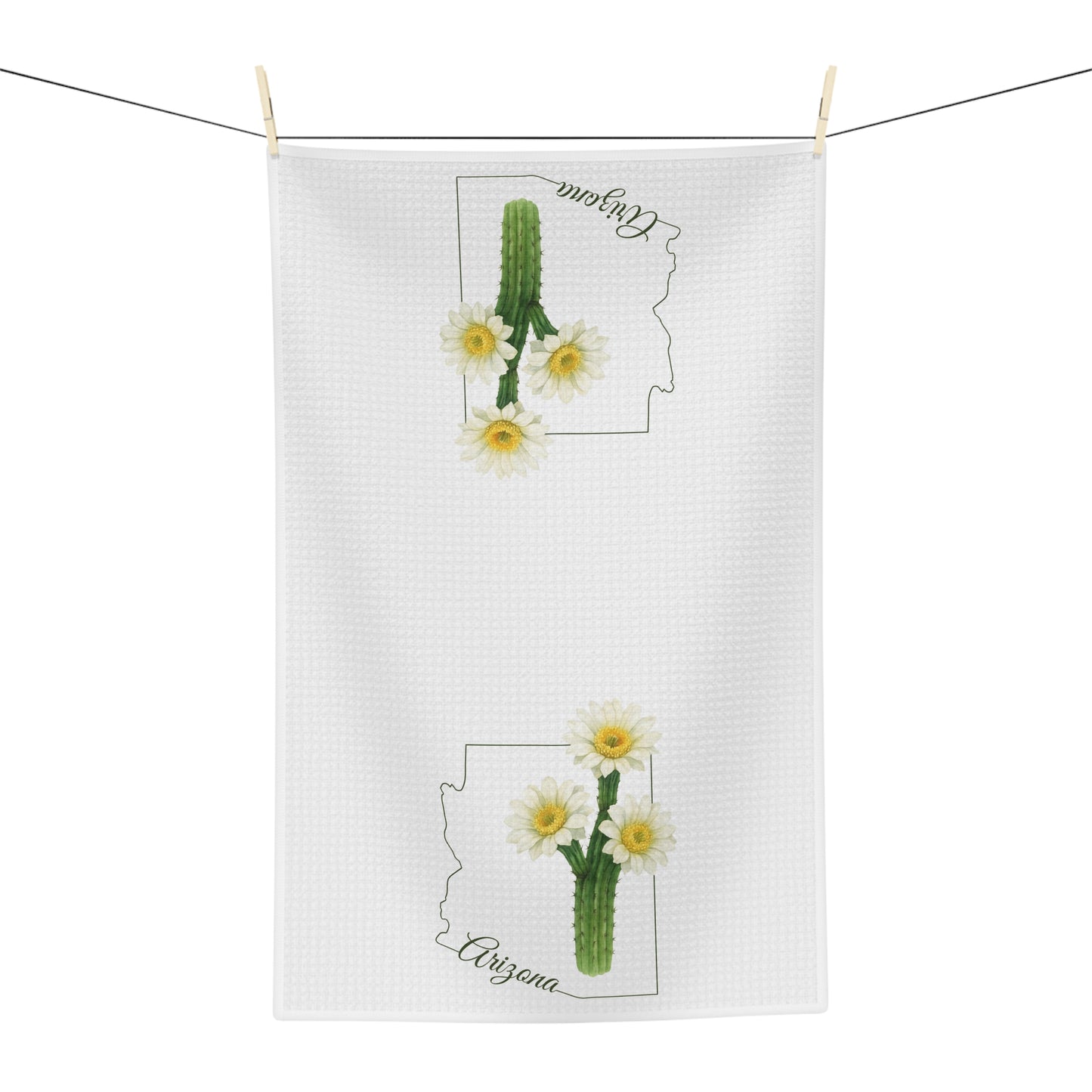 White microfiber tea towel with two saguaro cactus blooms, Arizona state outline, and "Arizona" in cursive.