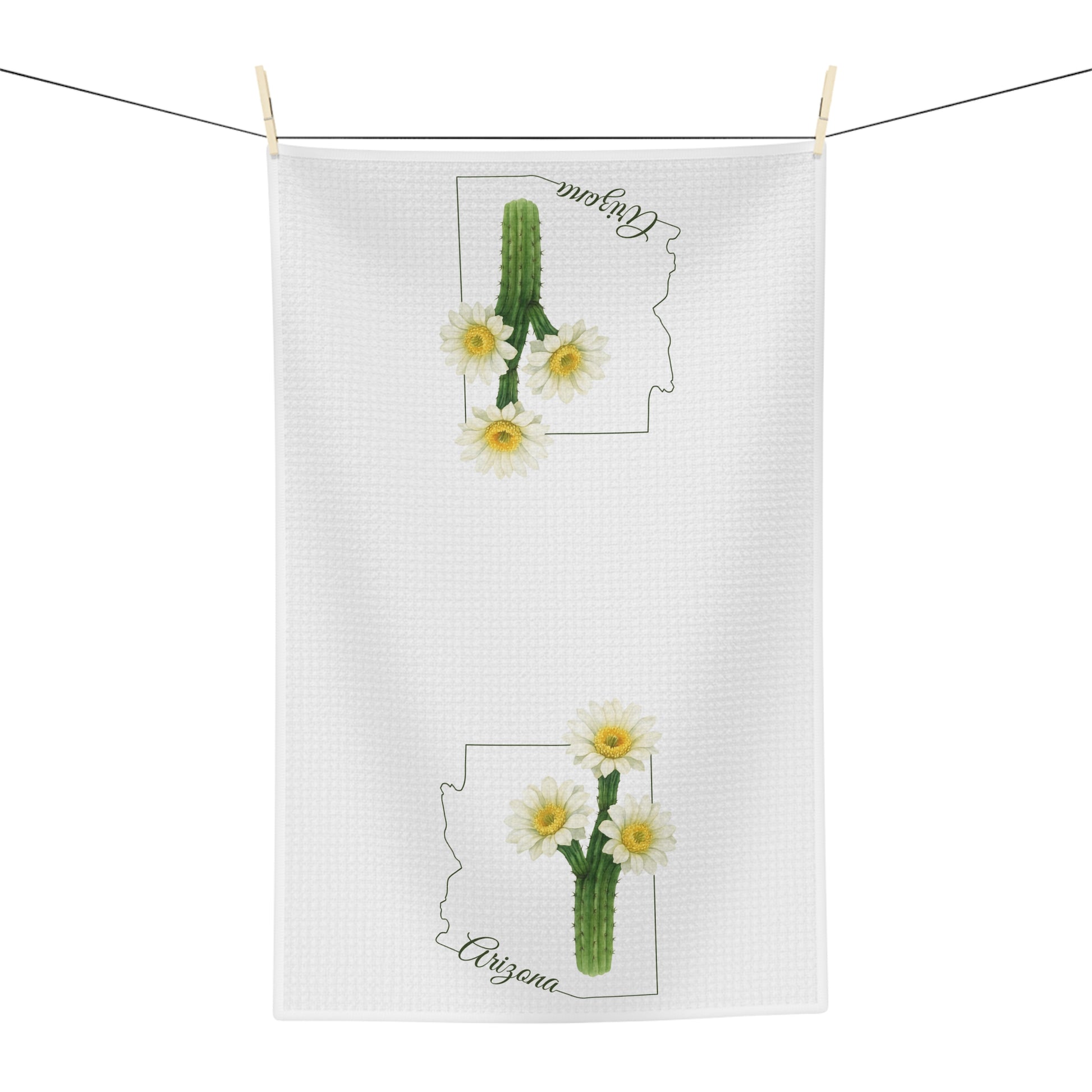 White microfiber tea towel with two saguaro cactus blooms, Arizona state outline, and "Arizona" in cursive.