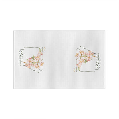White microfiber tea towel with two Arkansas state outlines filled with watercolor apple blossoms.