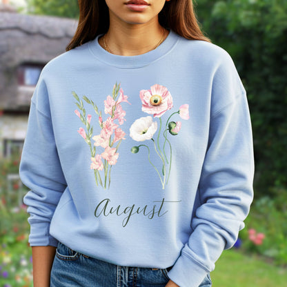 Light blue August birth month flower sweatshirt with watercolor gladiolus and poppy blooms.