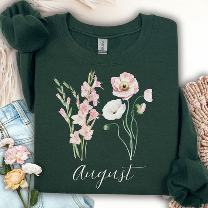 Forest Green August birth month flower sweatshirt with watercolor gladiolus and poppy blooms.
