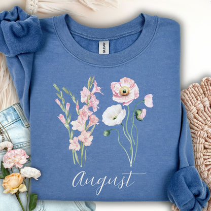 Indigo blue cotton-poly sweatshirt with watercolor gladiolus and poppy flowers, plus "August" script.