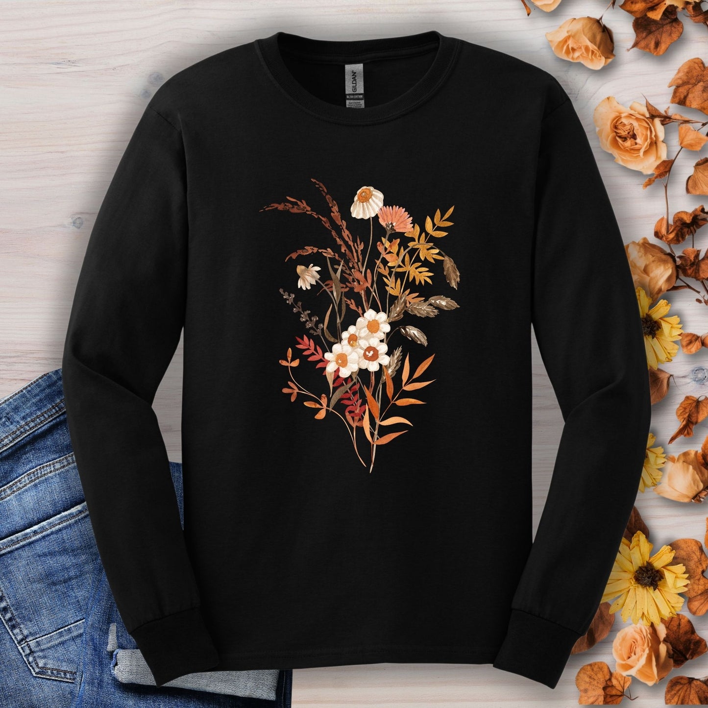 Black long sleeve tee with watercolor autumn wildflowers and botanicals, 100% cotton, unisex fit.