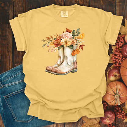 Mustard relaxed-fit cotton tee with watercolor cowboy boots and autumn blooms.