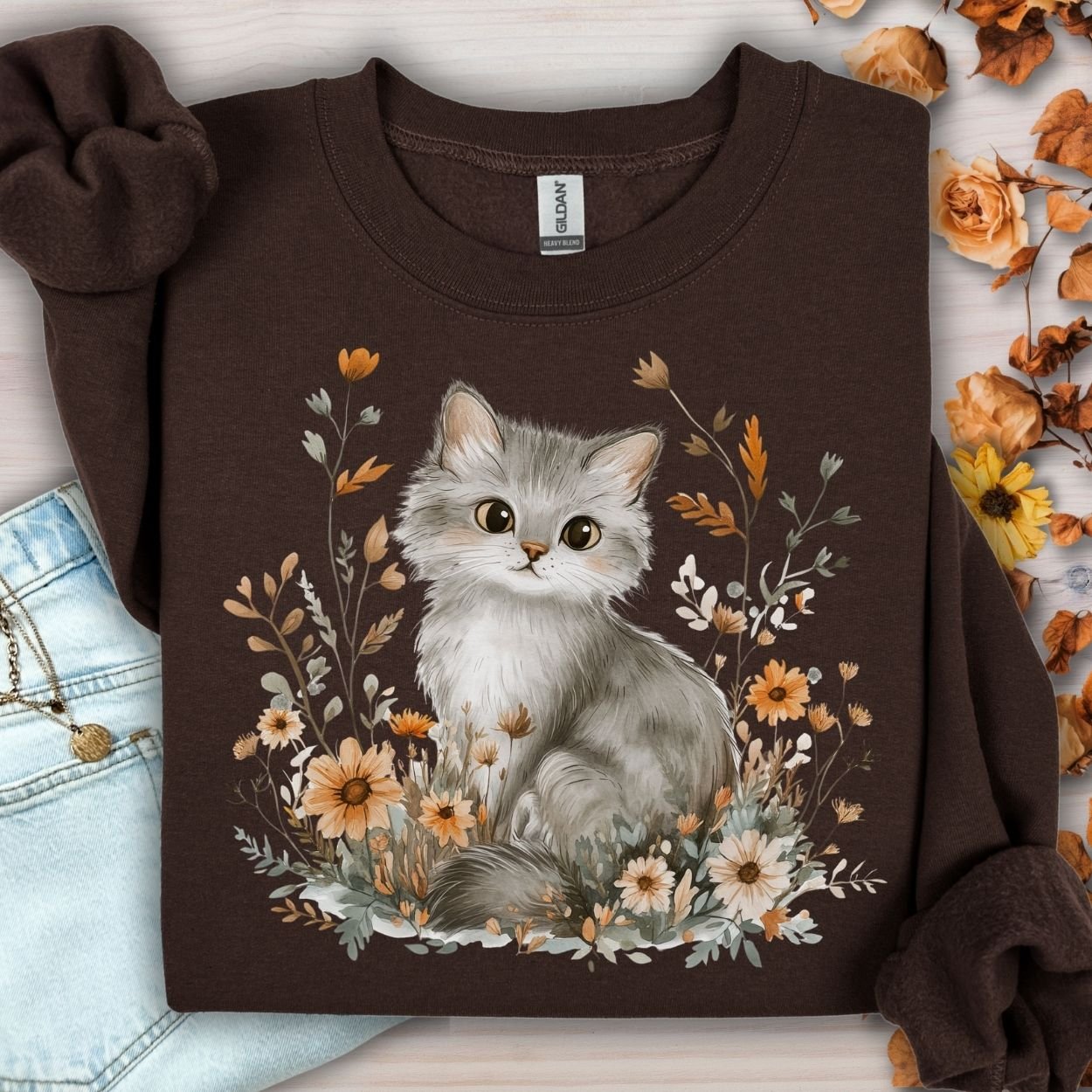 Dark Chocolate S sweatshirt with a grey kitten and autumn wildflowers design.