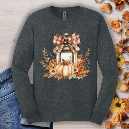 Dark heather long sleeve tee with a watercolor autumn lantern, plaid bow, pumpkin, and fall florals.
