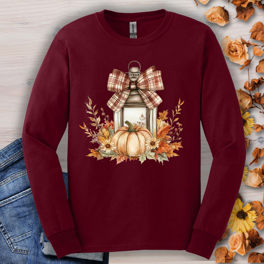 Maroon long sleeve tee with watercolor autumn lantern, pumpkin, and fall florals.