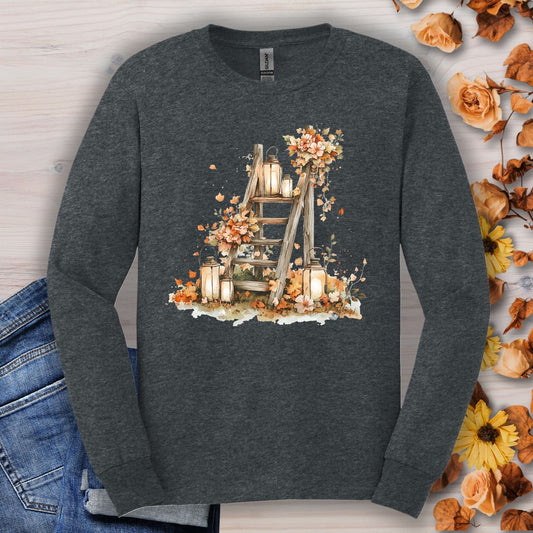 Dark Heather long sleeve tee with watercolor autumn lanterns, flowers, and rustic ladder design.