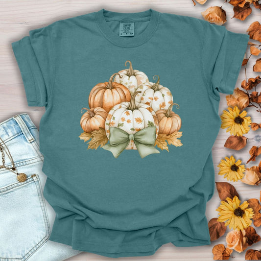 Blue Spruce Comfort Colors t-shirt with watercolor pumpkins, fall leaves, and a sage green bow.