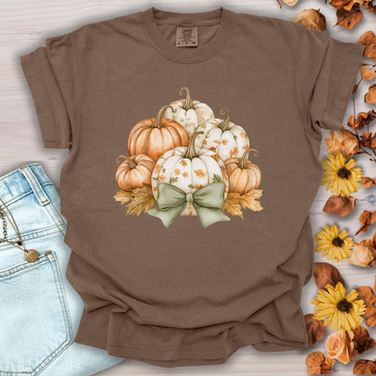Espresso Comfort Colors tee with watercolor pumpkins, fall leaves, and a sage green bow.