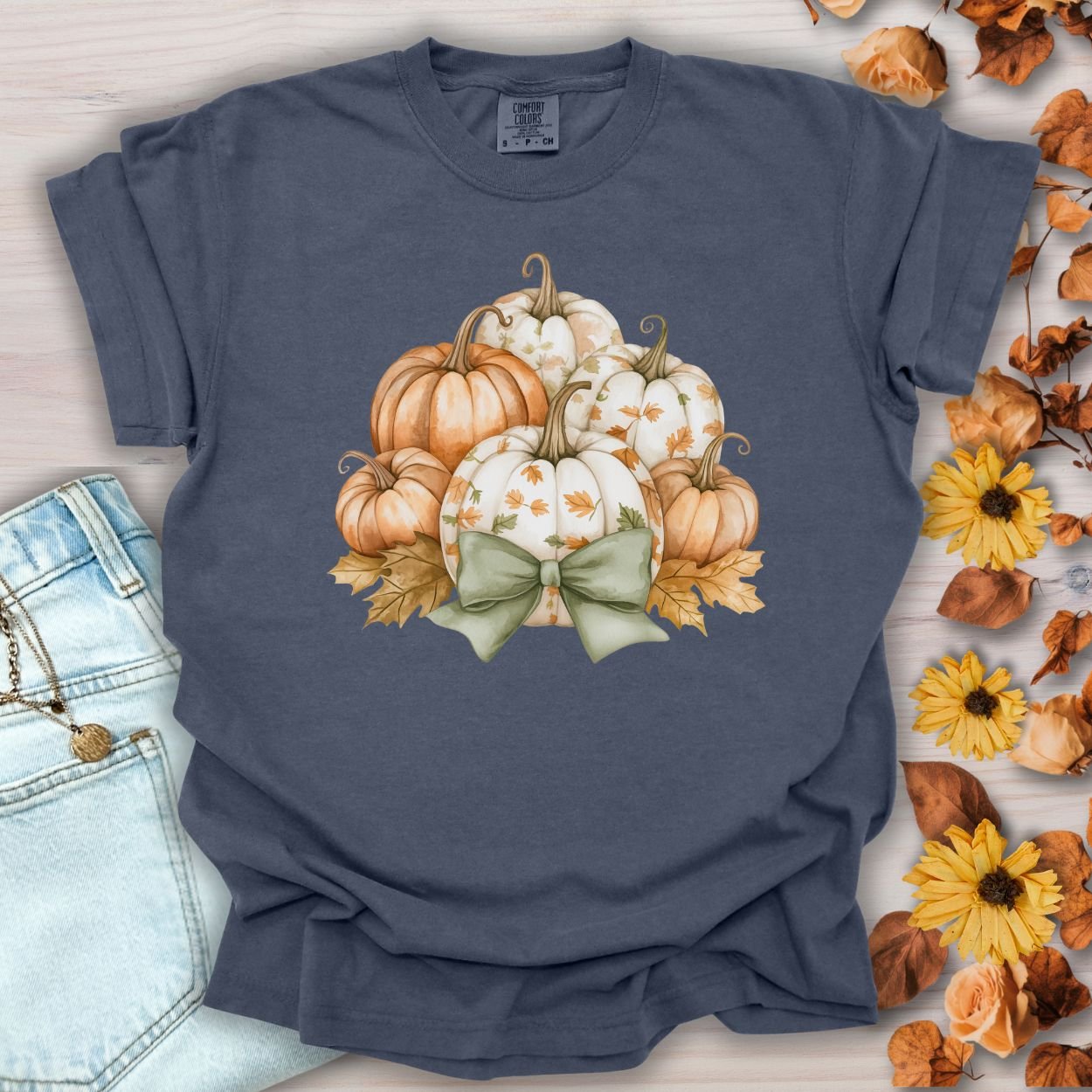 Denim Comfort Colors tee with watercolor pumpkins, autumn leaves, and a sage green bow.