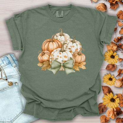 Moss green Comfort Colors t-shirt with watercolor pumpkins, autumn leaves, and a sage green bow.