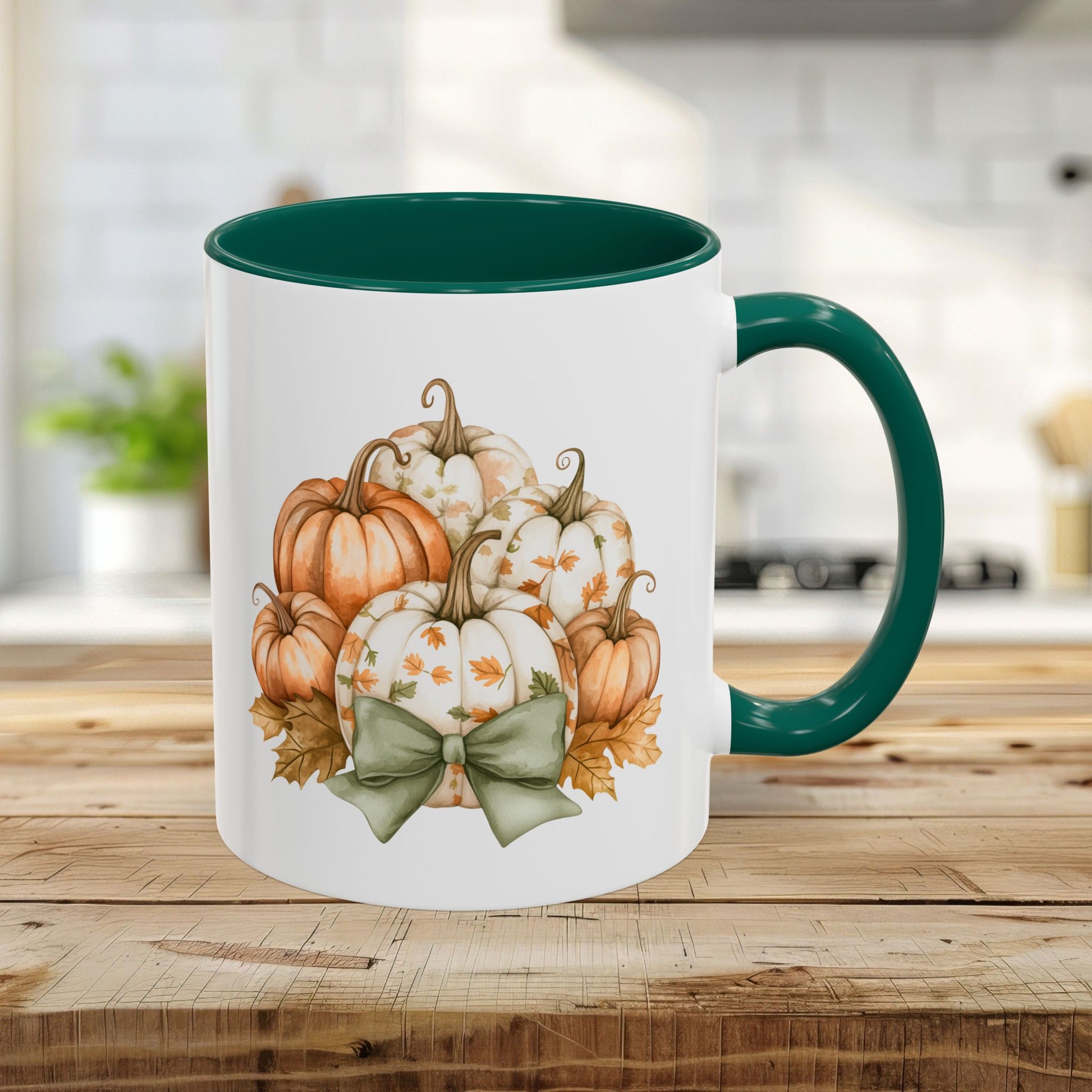White 11oz ceramic mug with green interior and handle, featuring a watercolor pumpkin and foliage design.
