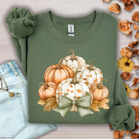 Military green Gildan cotton-poly sweatshirt with cottage core pumpkins and a green bow.