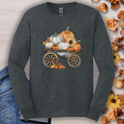 Dark Heather long sleeve tee with a watercolor wagon of white and orange pumpkins and fall leaves.