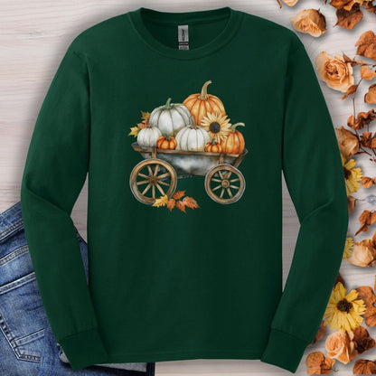 Forest Green long sleeve tee with a watercolor wagon of white and orange pumpkins and fall leaves.