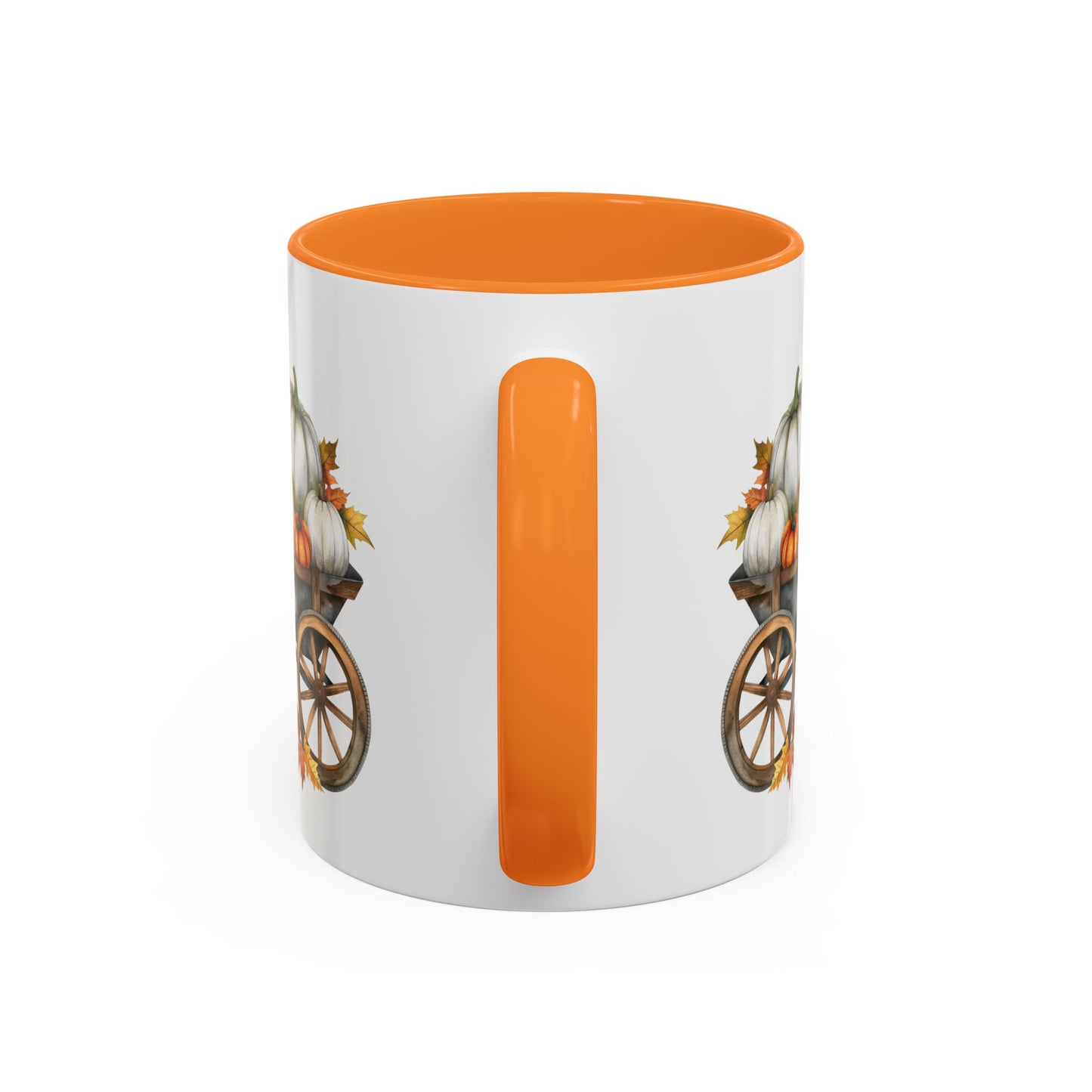 White ceramic mug with an orange interior and handle, featuring a watercolor-style autumn pumpkin harvest wagon design.