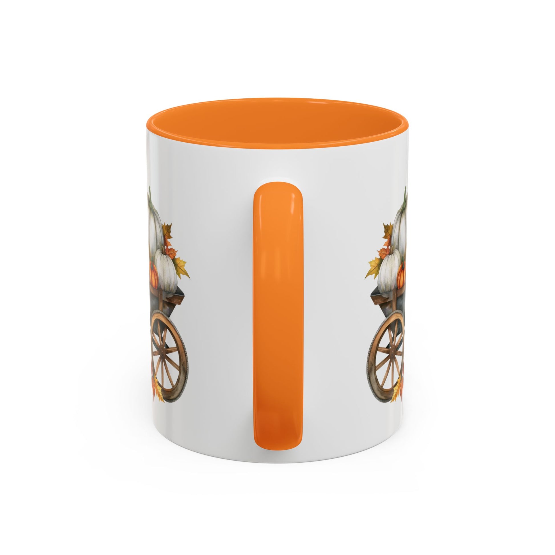 White ceramic mug with an orange interior and handle, featuring a watercolor-style autumn pumpkin harvest wagon design.