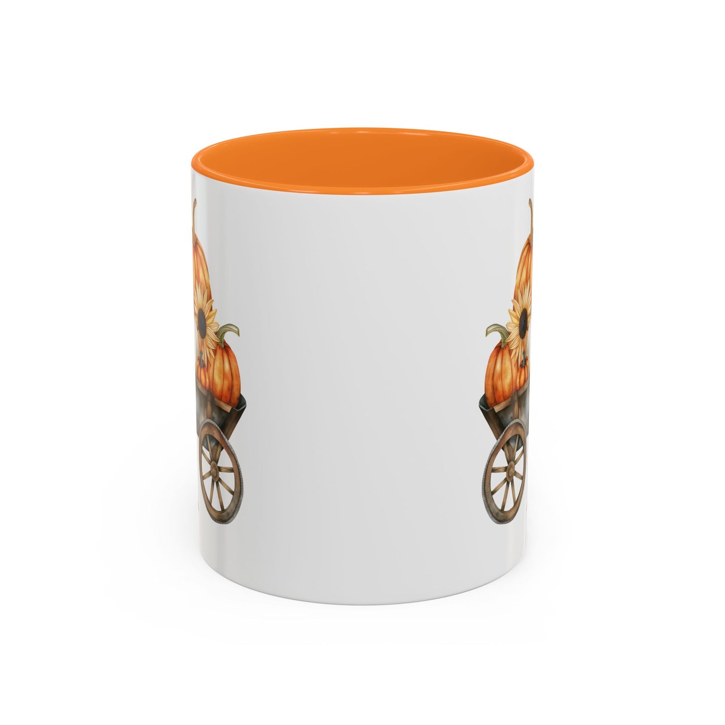 White ceramic mug with an orange interior and handle, featuring a watercolor-style autumn pumpkin wagon design.