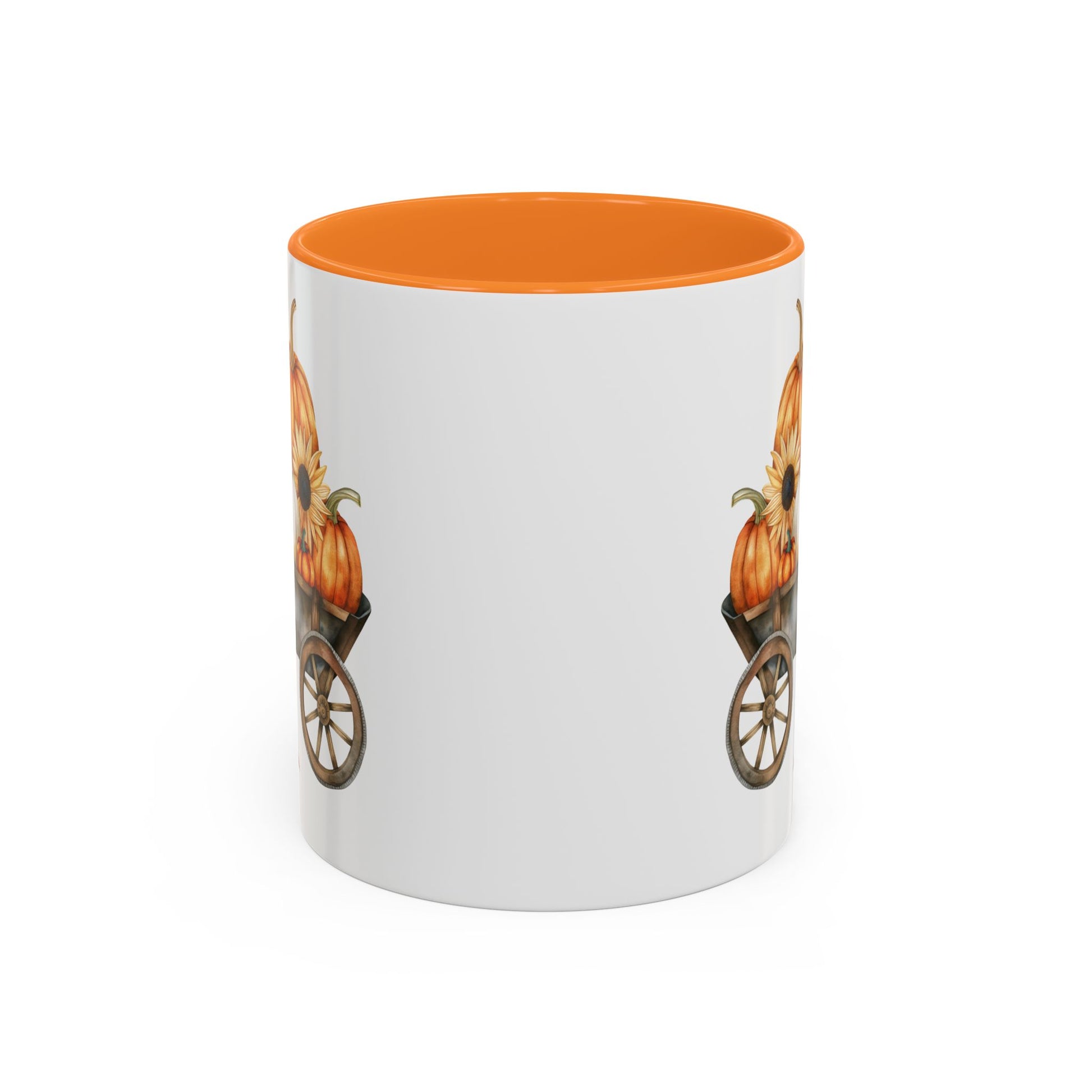 White ceramic mug with an orange interior and handle, featuring a watercolor-style autumn pumpkin wagon design.